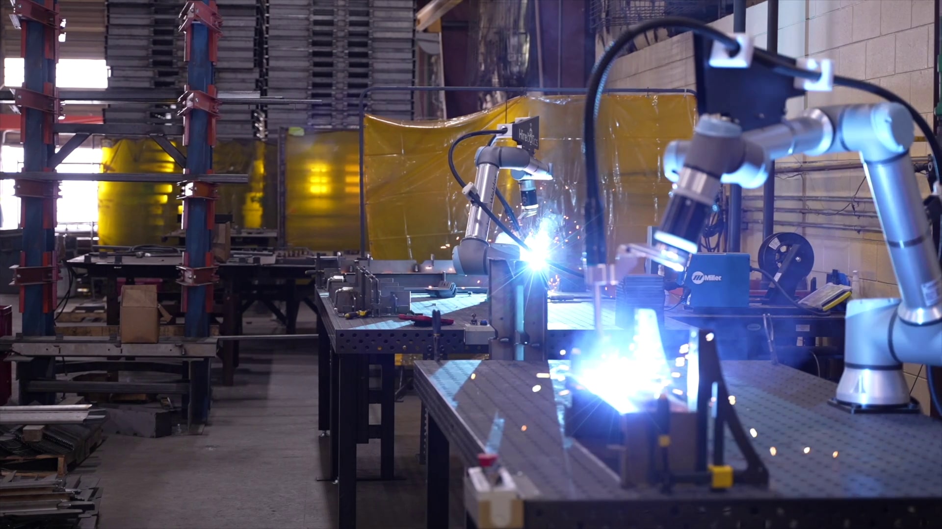 two-cobot-welder-in-action-welding